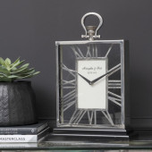 Silver and black skeletal mantel clock 